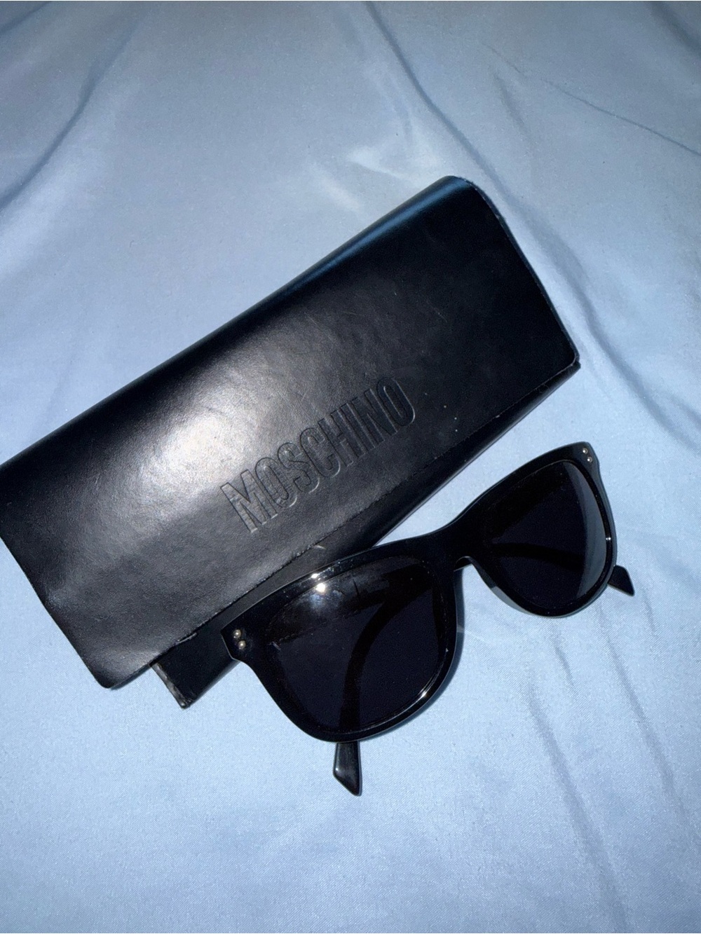 Moschino women’s Black Sunglasses with gold lettering